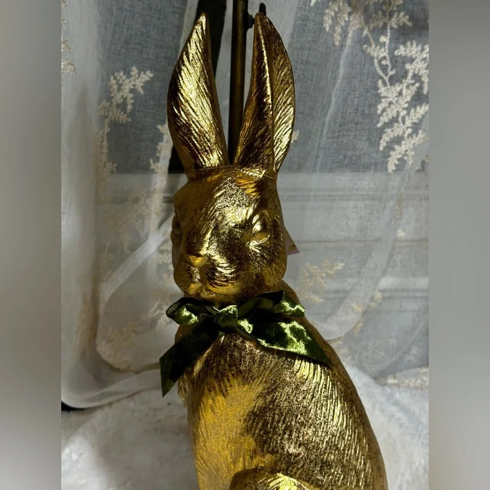 Jolie Fleur gold rabbit with forest green bow decor